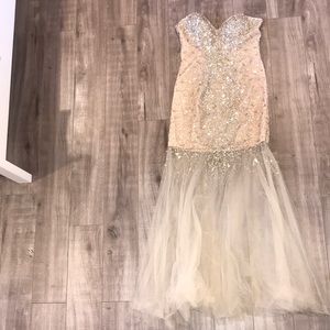 Nude gown with clear colored jewels